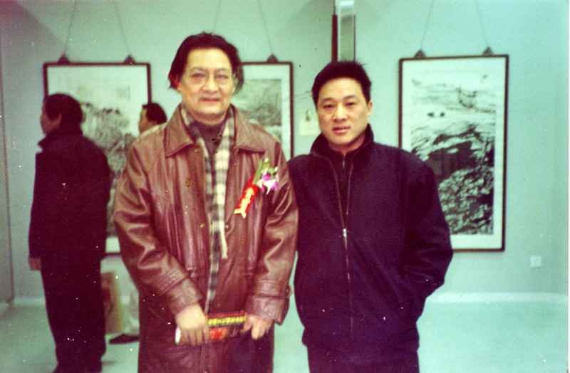 与全国著名画家郭怡琮合影