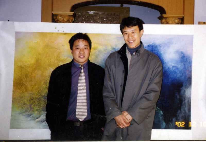 与全国著名画家冯一鸣合影